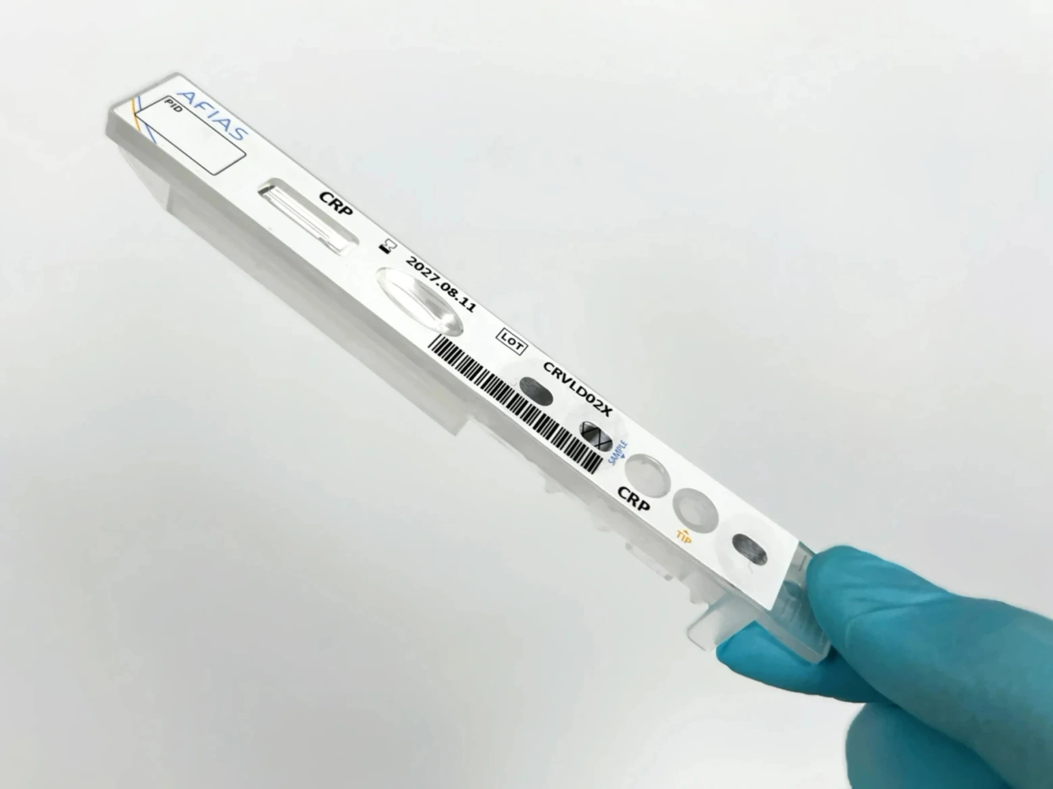 AFIAS Testkassette in der Hand
